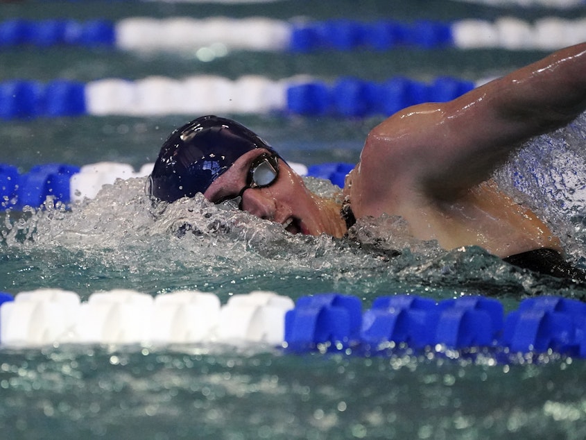 caption: University of Pennsylvania transgender athlete Lia Thomas competes at the NCAA Swimming and Diving Championships  in March. Her success became a focus of debate.
