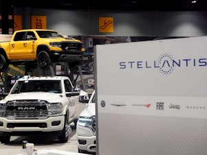 caption: Stellantis shows off its Ram truck lineup at the Chicago Auto Show in Chicago on Feb. 9, 2023. The UAW ordered 6,800 union members to walk off their jobs at the company's lucrative Ram pickup assembly plant in Sterling Heights, Mich.