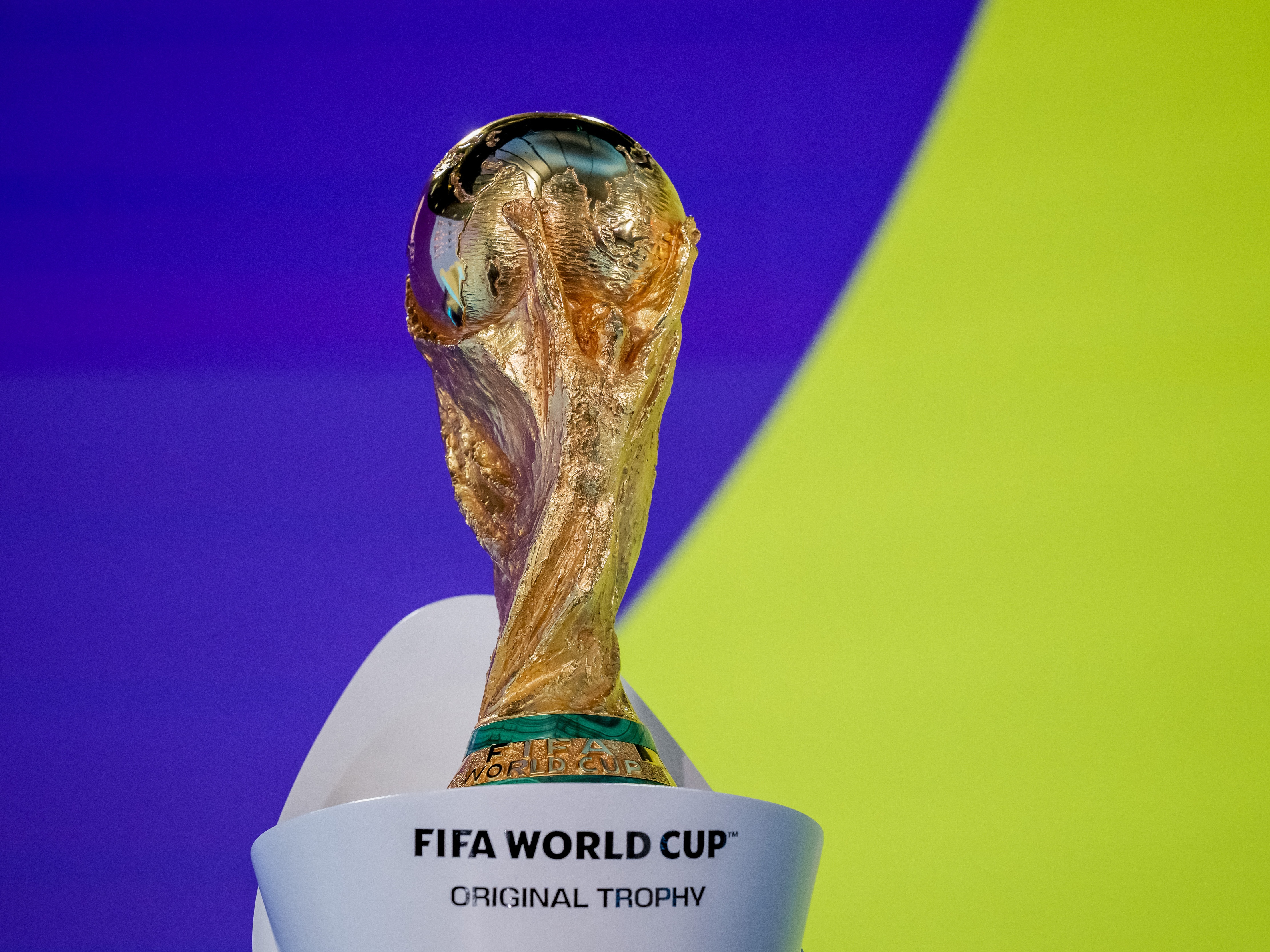 caption: The FIFA World Cup trophy is displayed at an event in Zurich, Switzerland, on Nov. 20, 2025.
