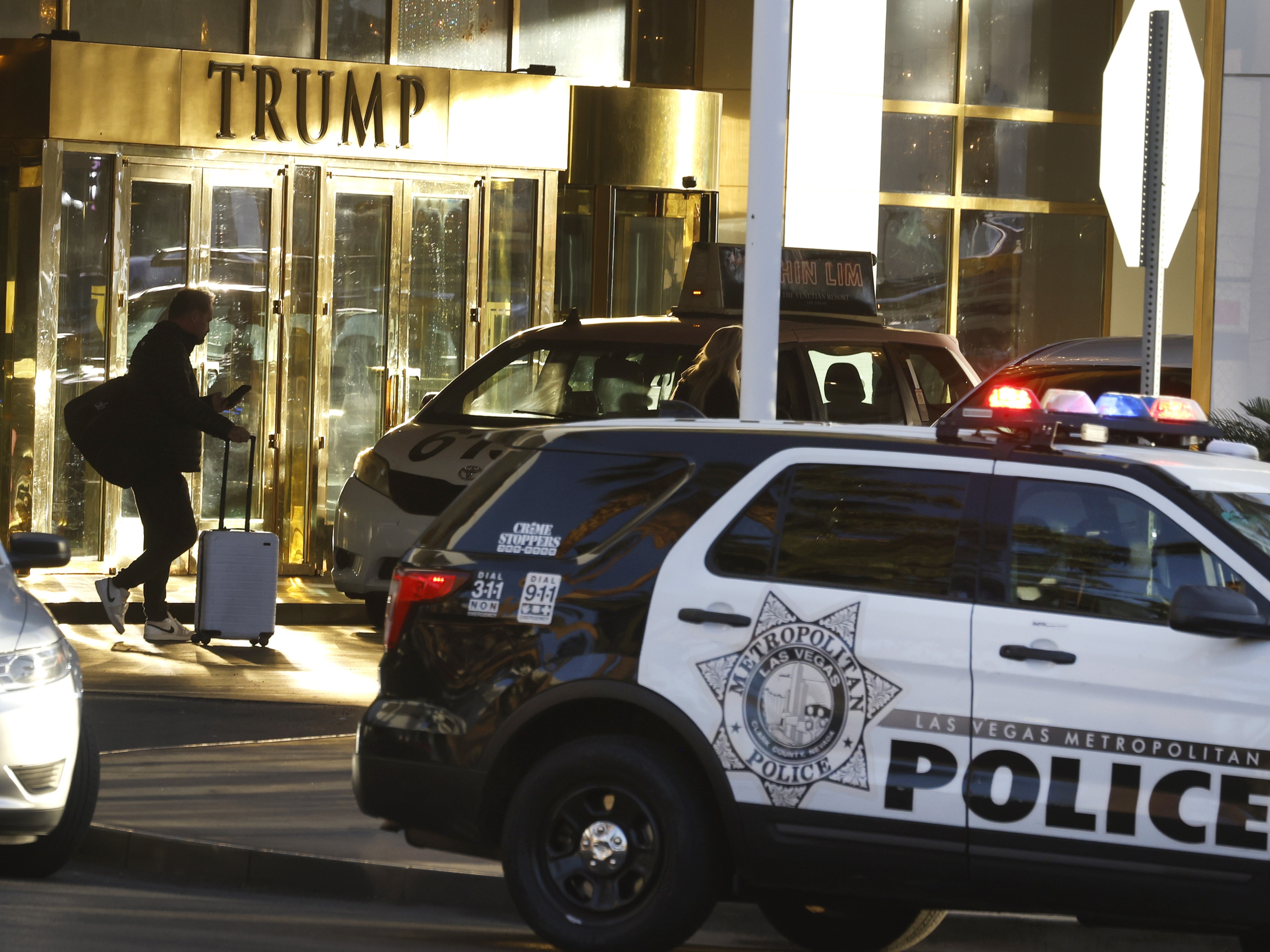 caption: A guest is seen at the valet area outside Trump International Hotel in Las Vegas on Thursday. A Green Beret who was killed Wednesday in a Tesla Cybertruck explosion outside the hotel left a note saying it was designed as a "wakeup call" for the country's ills, investigators said.