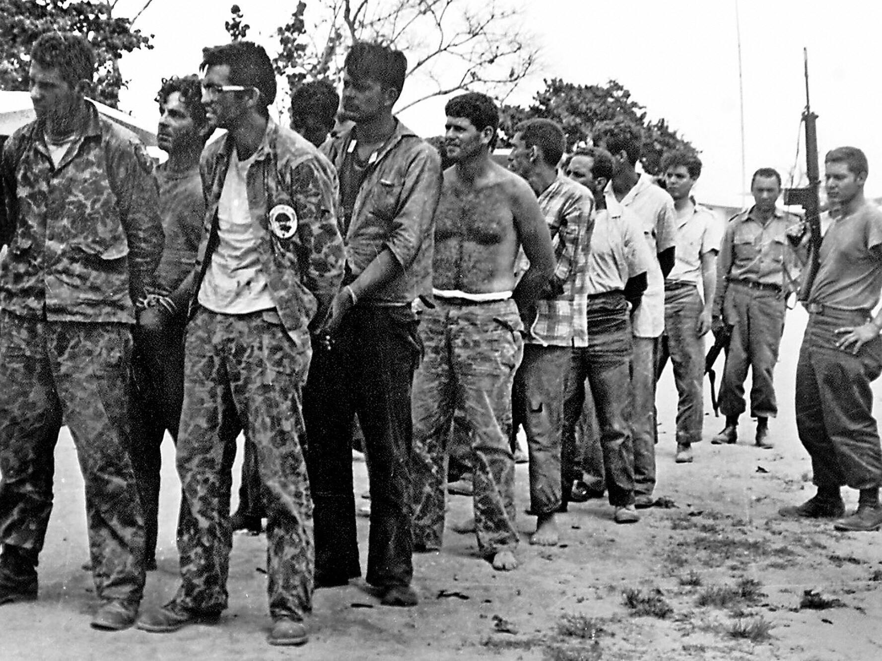 caption: An April 1961 file photo shows a group of CIA-backed Cuban counterrevolutionaries after their capture in the Bay of Pigs, Cuba.