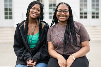 caption: Makiyah Hicks and Jonetta Harrison in front of their high school, Duke Ellington School of the Arts, in Washington, D.C. They are finalists in this year's NPR Student Podcast Challenge for their entry "Loss and Transformation."