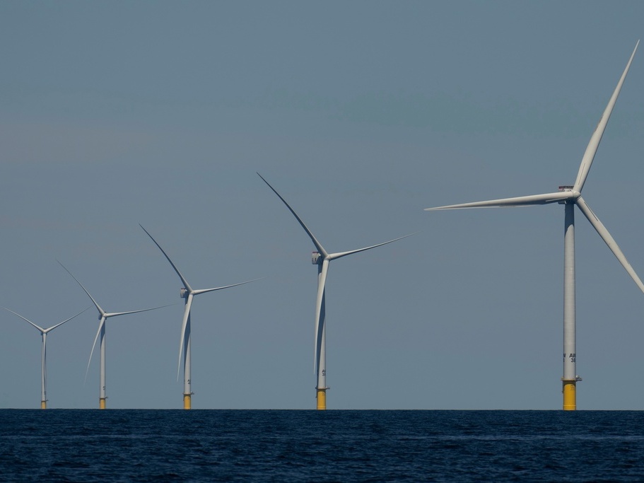 caption: Wind turbines operate in July at the Vineyard Wind 1 offshore wind farm off the coast of Massachusetts.