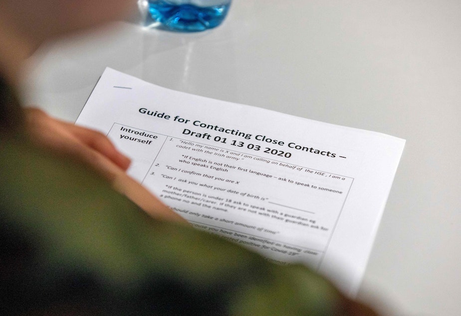 caption: Contact tracing involves a painstaking process of identifying and reaching out to all of a COVID-19 patient's recent contacts. In Ireland, Irish Army cadets assist with the contact tracing work in Dublin.