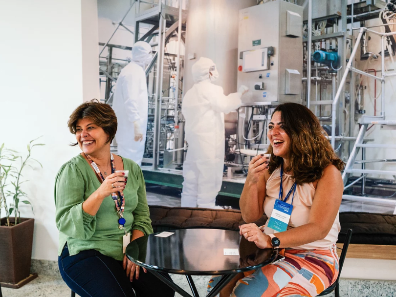 caption: Patricia Neves (left) and Ana Paula Ano Bom take a break at the institute in Rio de Janeiro where they work. The two scientists say they've been inseparable since they met in college. Now their friendship has made it possible to launch a remarkable partnership to make mRNA vaccines accessible to the world.