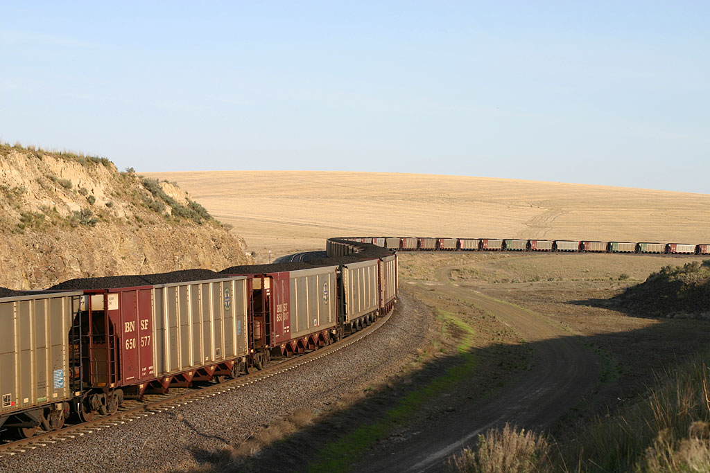caption: A coal train makes its way through Eastern Washington.
