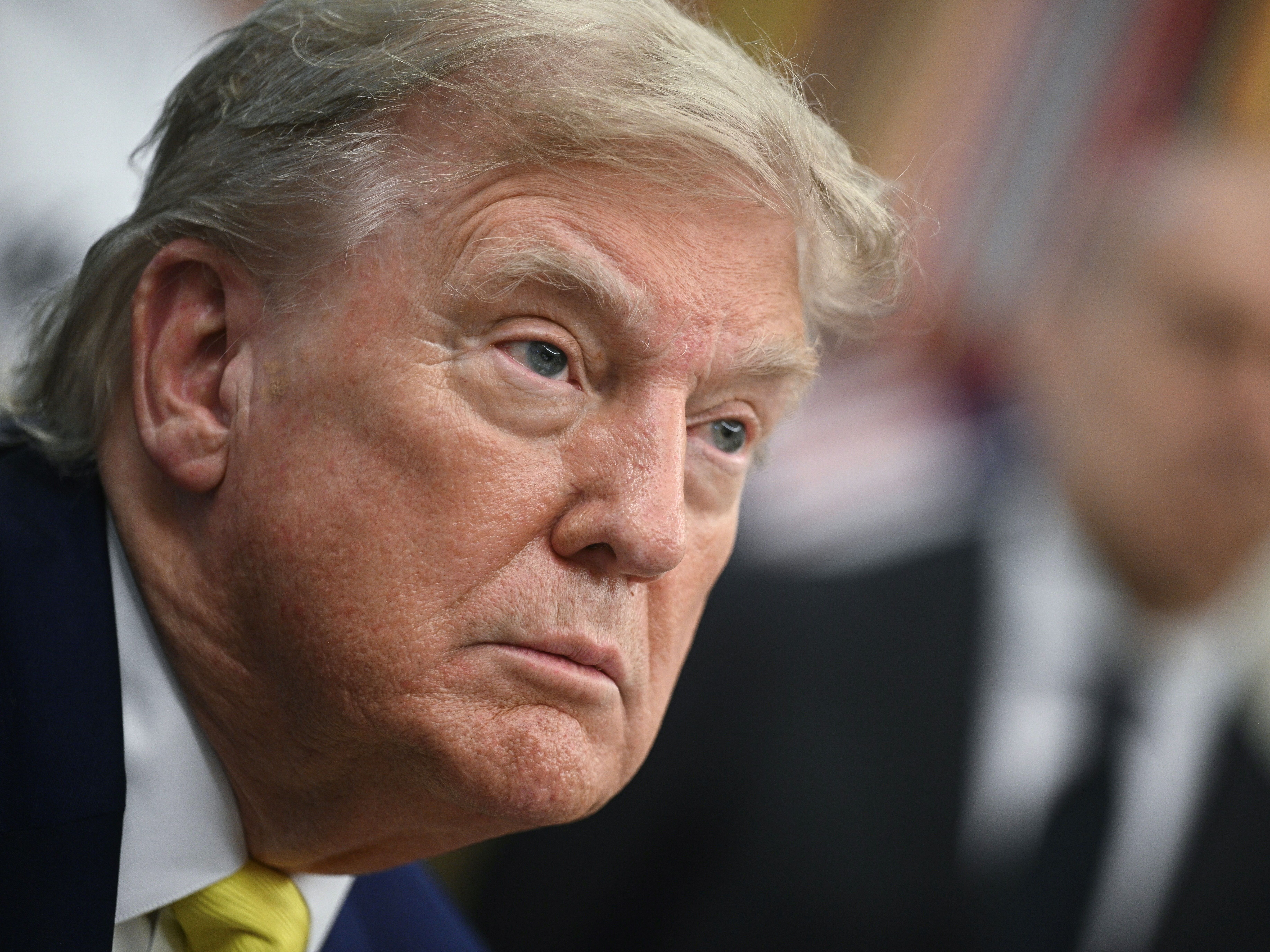 caption: President Trump is rolling out changes that would make it easier to fire federal employees who currently have significant job protections.