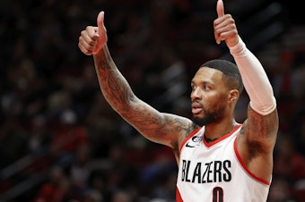 caption: Damian Lillard of the Portland Trail Blazers reacts during a game against the San Antonio Spurs on January 23, 2023.
