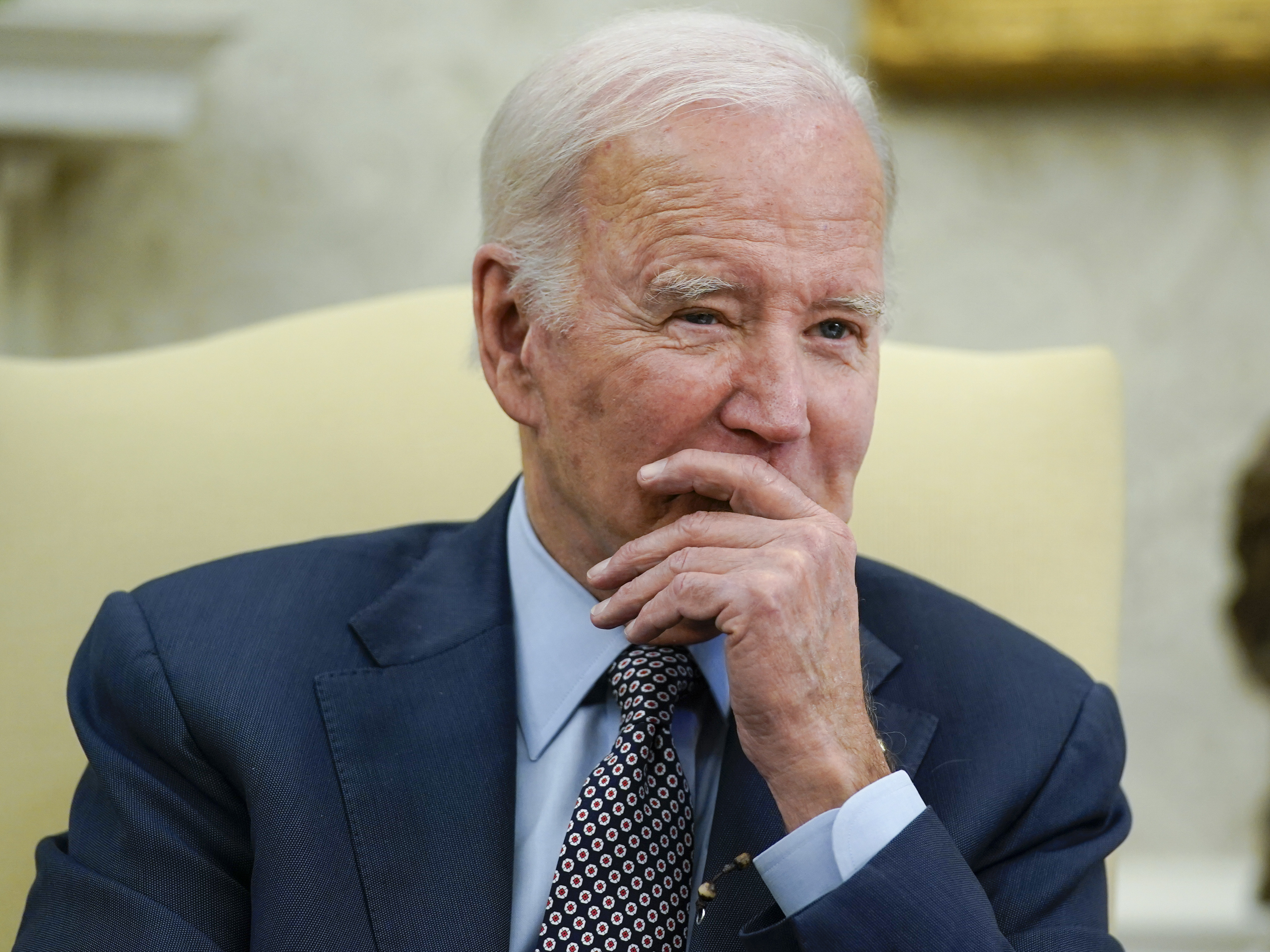 caption: President Joe Biden listens as he meets with House Speaker Kevin McCarthy of Calif., to discuss the debt limit in the Oval Office of the White House, Monday, May 22, 2023, in Washington.