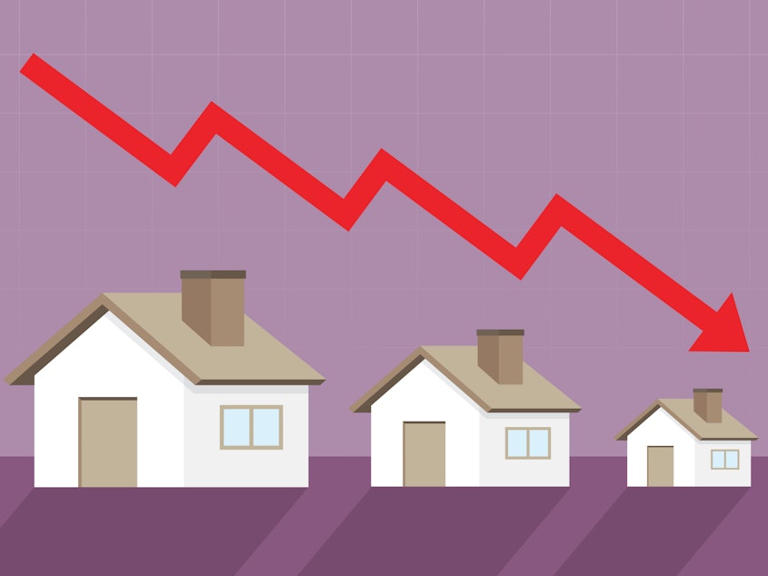 caption: Both home prices and the pace of home sales are falling nationally as higher mortgage rates cool off the market.