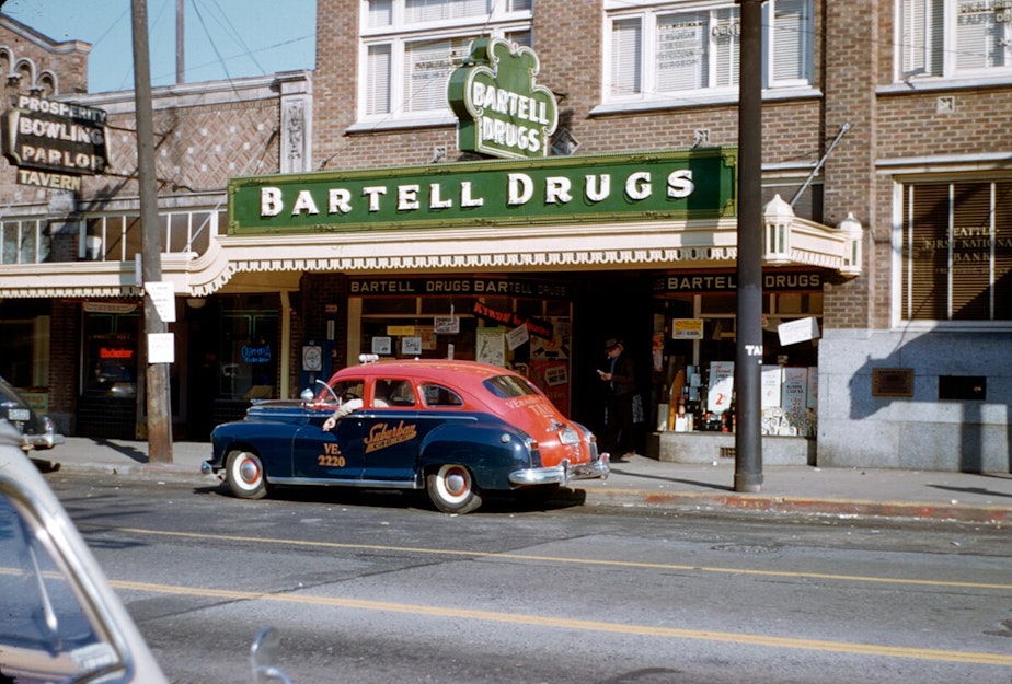 caption: Bartell Drugs on Greenwood Avenue in Seattle, just north of 85th Street, circa 1950s.