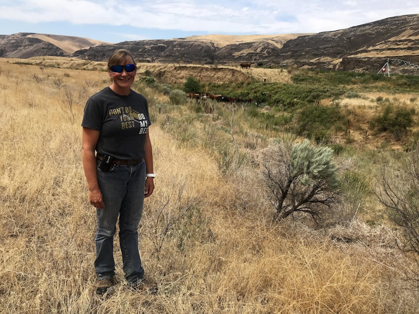 caption: Rancher Molly Linville would like ranchers to be able to fight fires on their own property in Washington. She hopes the state will allow ranchers to form rangeland fire protection associations in areas where no agency is assigned to respond to wildland fires.