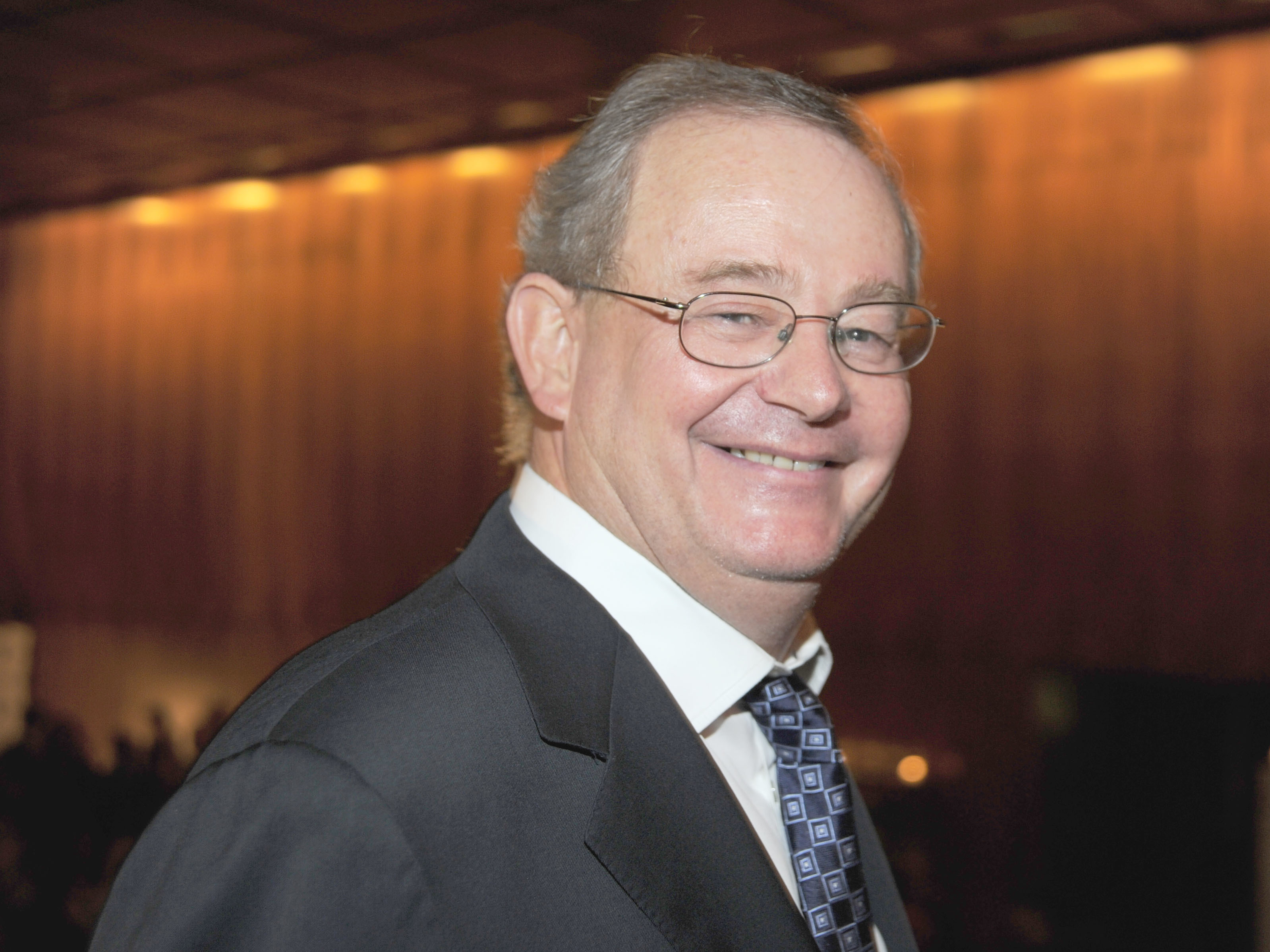 caption: <em>New York Post</em> Editor-in-Chief Col Allan attends a party in 2010.