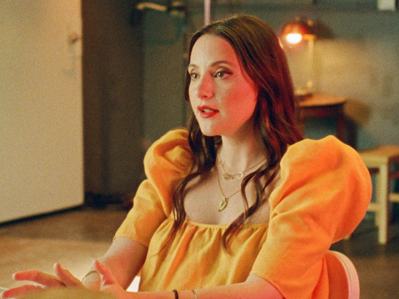 caption: Former Nickelodeon star Alexa Nikola speaks during the docuseries <em>Quiet on Set.</em>