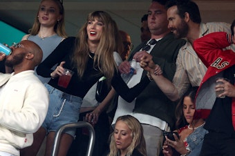 caption: Singer Taylor Swift and actor Ryan Reynolds are seen ahead of the game between the Kansas City Chiefs and the New York Jets at MetLife Stadium on Sunday in East Rutherford, N.J.