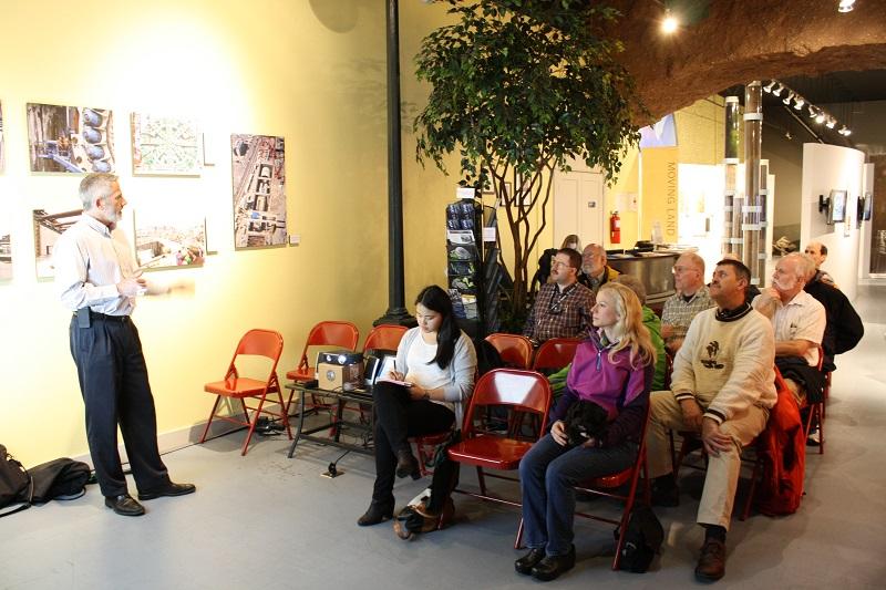 caption: In this file photo, Matt Preedy talks about Bertha before a crowd of armchair engineers during a recent Art Walk in Pioneer Square.
