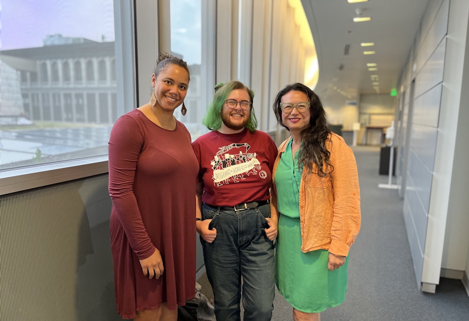 Caption: Kaileah Baldwin (left), chair of the board of the Seattle Social Housing Public Development Authority, with board members Devyn Forschmiedt (center) and secretary Dawn Dailey (right).