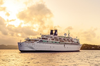 caption: A Freewinds cruise ship, owned and operated by the Church of Scientology, was reportedly the vessel quarantined in St. Lucia because of a confirmed case of Measles onboard.