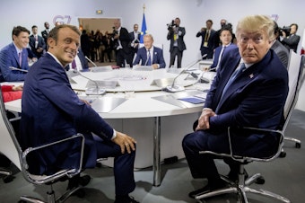 caption: French President Emmanuel Macron (left) and President Trump participate in a G-7 working session. Trump is in Biarritz, France, for the G-7 summit of the world's biggest economic powers.