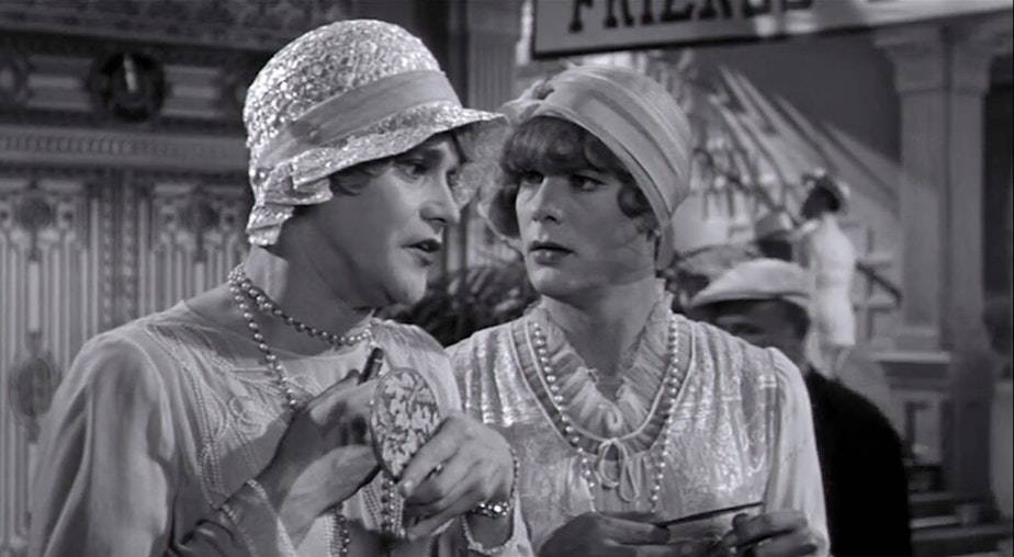 caption: Jack Lemmon and Tony Curtis are utterly convincing in their roles as Josephine and Daphne.