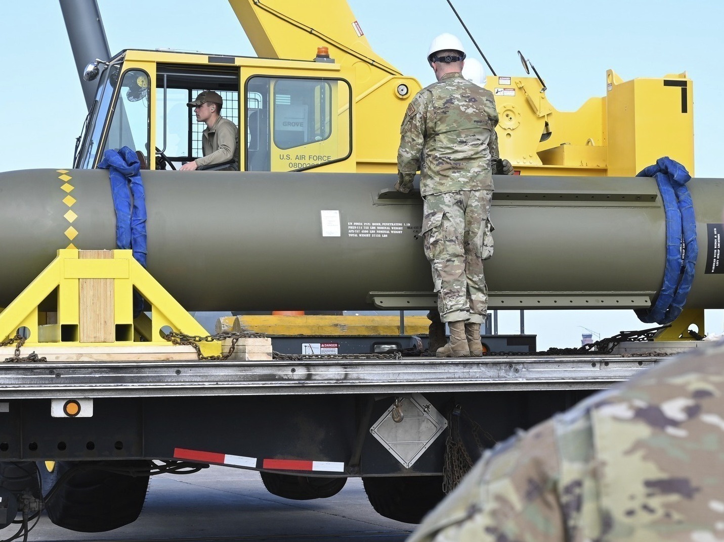 caption: Airmen look at a GBU-57, or a Massive Ordnance Penetrator bomb, at Whiteman Air Force Base in Missouri on May 2, 2023.