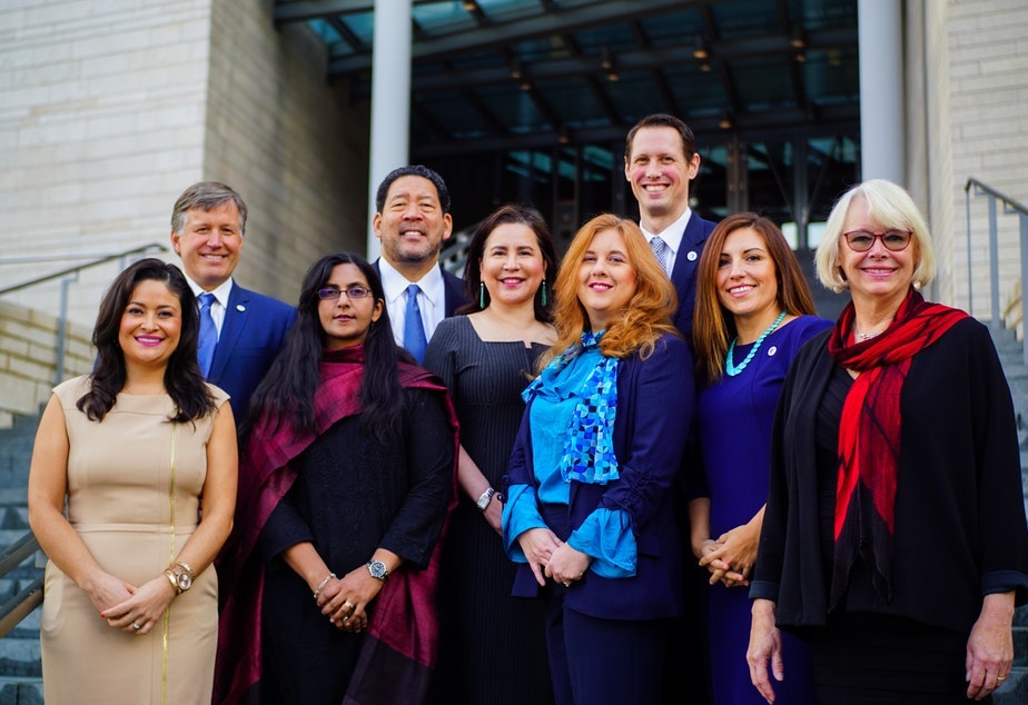 caption: Seattle's 2018-19 City Council includes two members who represent the entire city, and seven who represent a specific district.