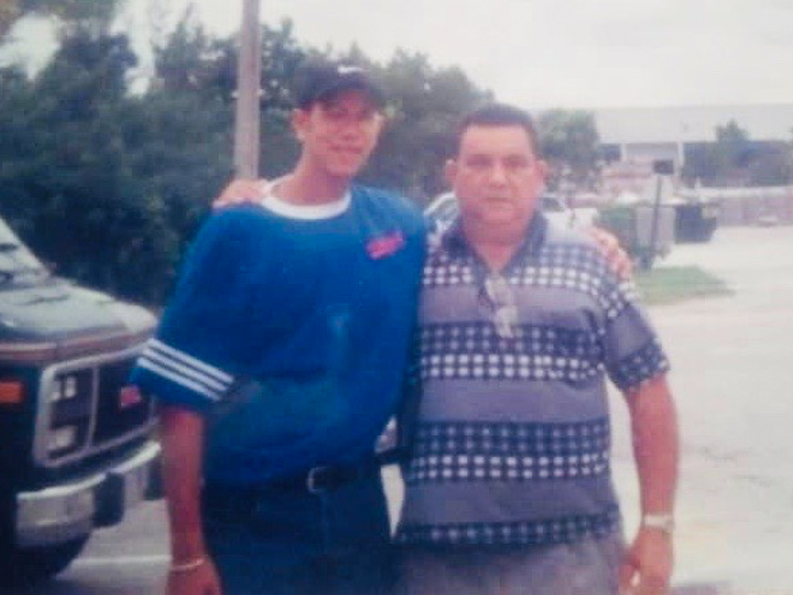 caption: Gustavo Ocando Alex and his dad, Gilberto, in 1999. Last year, his father died of a heart attack at age 81.