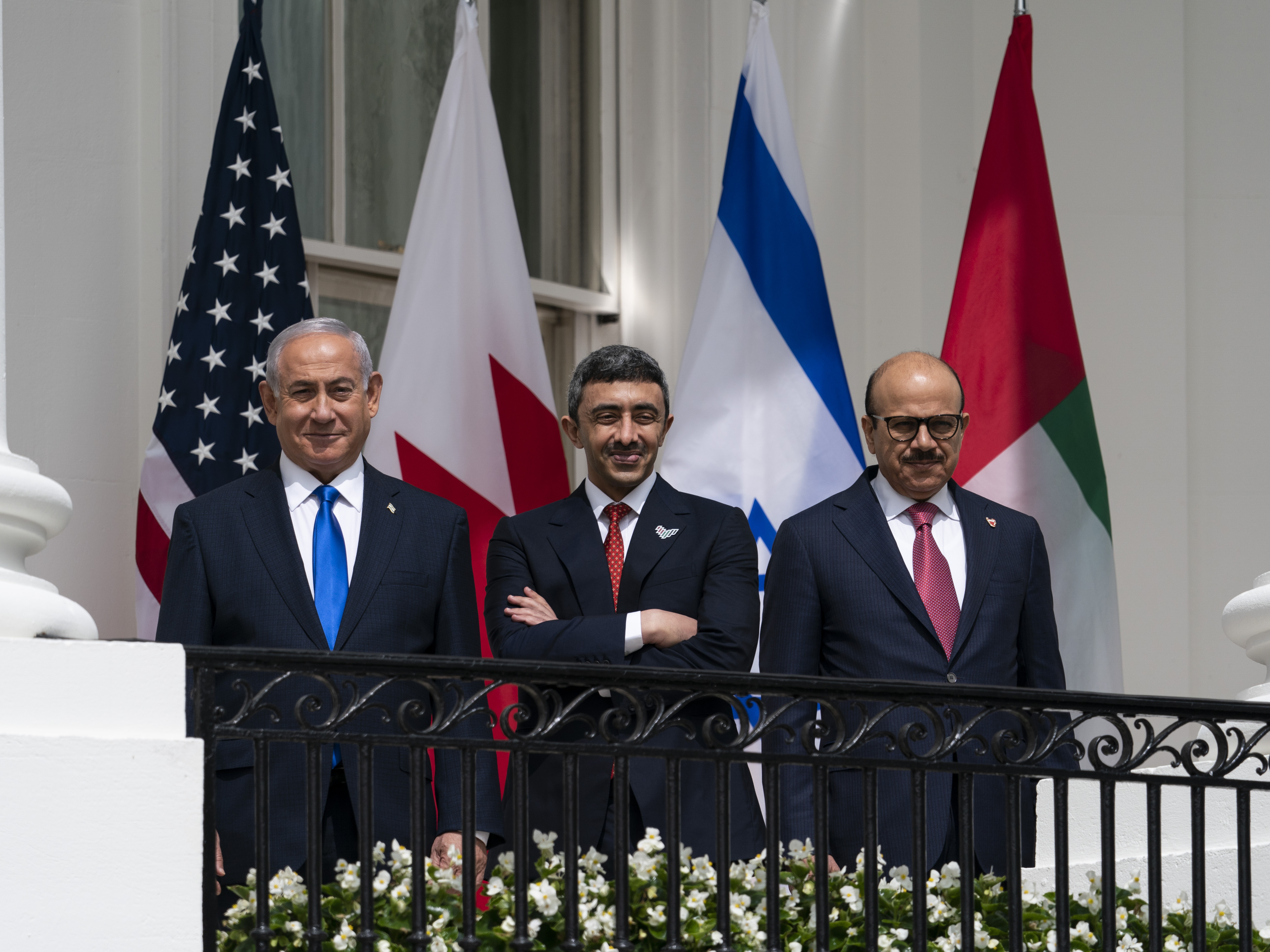 caption: Israeli Prime Minister Benjamin Netanyahu (left), United Arab Emirates Foreign Minister Abdullah bin Zayed al-Nahyan (center) and Bahrain Foreign Minister Khalid bin Ahmed Al Khalifa during the Abraham Accords signing ceremony in September.