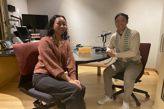 caption: Annika Prom (left) and Prenz Sa-Ngoun (right) catch up at KUOW.