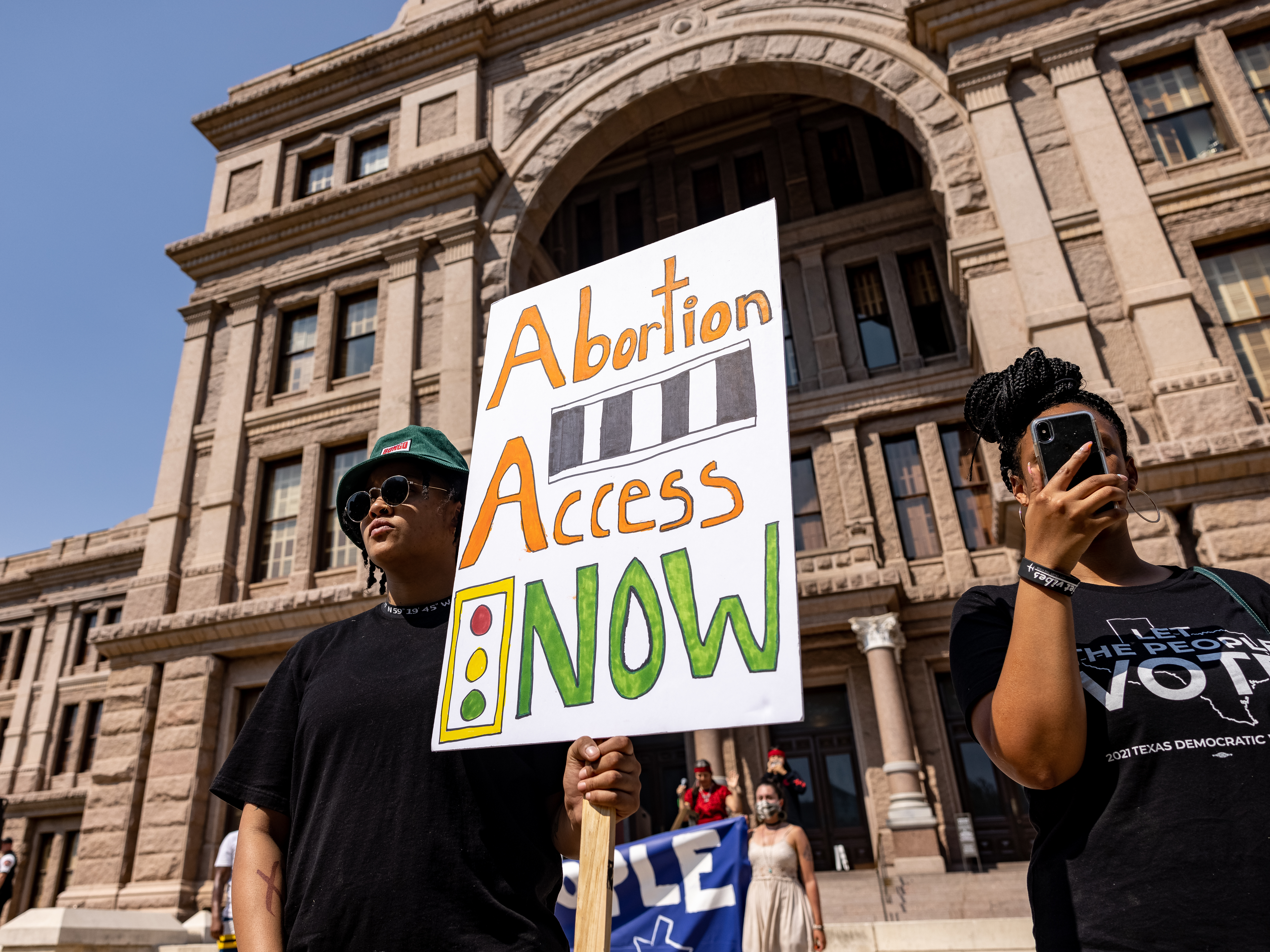 caption: Demonstrators at the Texas State Capitol call for access to abortion at a rally in September 2021 in Austin. Days earlier, Texas had enacted SB 8, which bans most abortions after about six weeks.