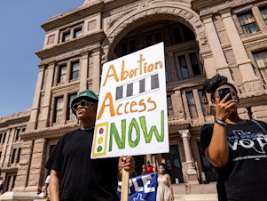 caption: Demonstrators at the Texas State Capitol call for access to abortion at a rally in September 2021 in Austin. Days earlier, Texas had enacted SB 8, which bans most abortions after about six weeks.