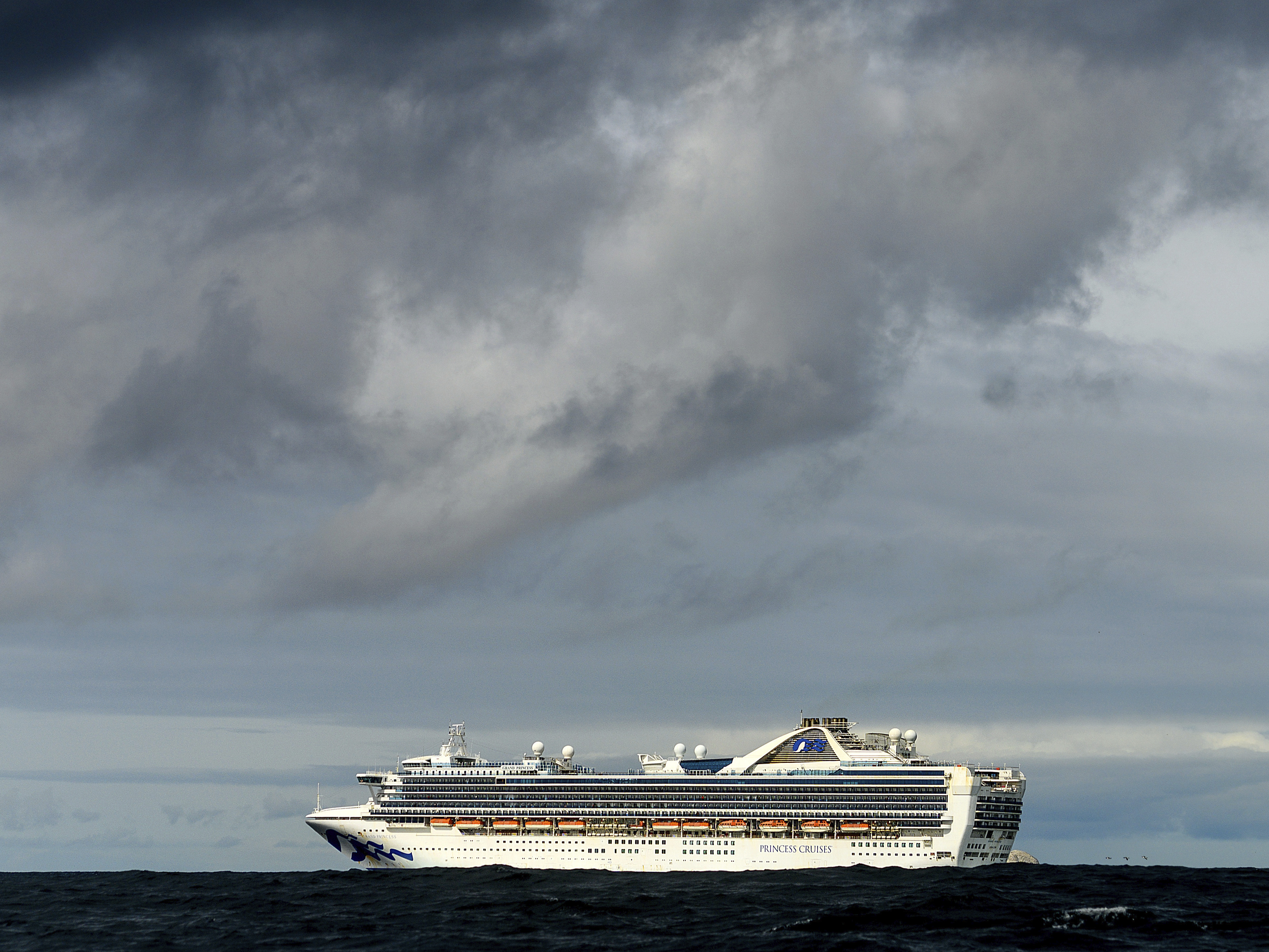 caption: The Grand Princess, with at least 21 coronavirus cases on board, is scheduled to dock at the Port of Oakland on Monday. U.S. agencies are highlighting the risks of traveling on cruise ships as the country reports more COVID-19 cases.