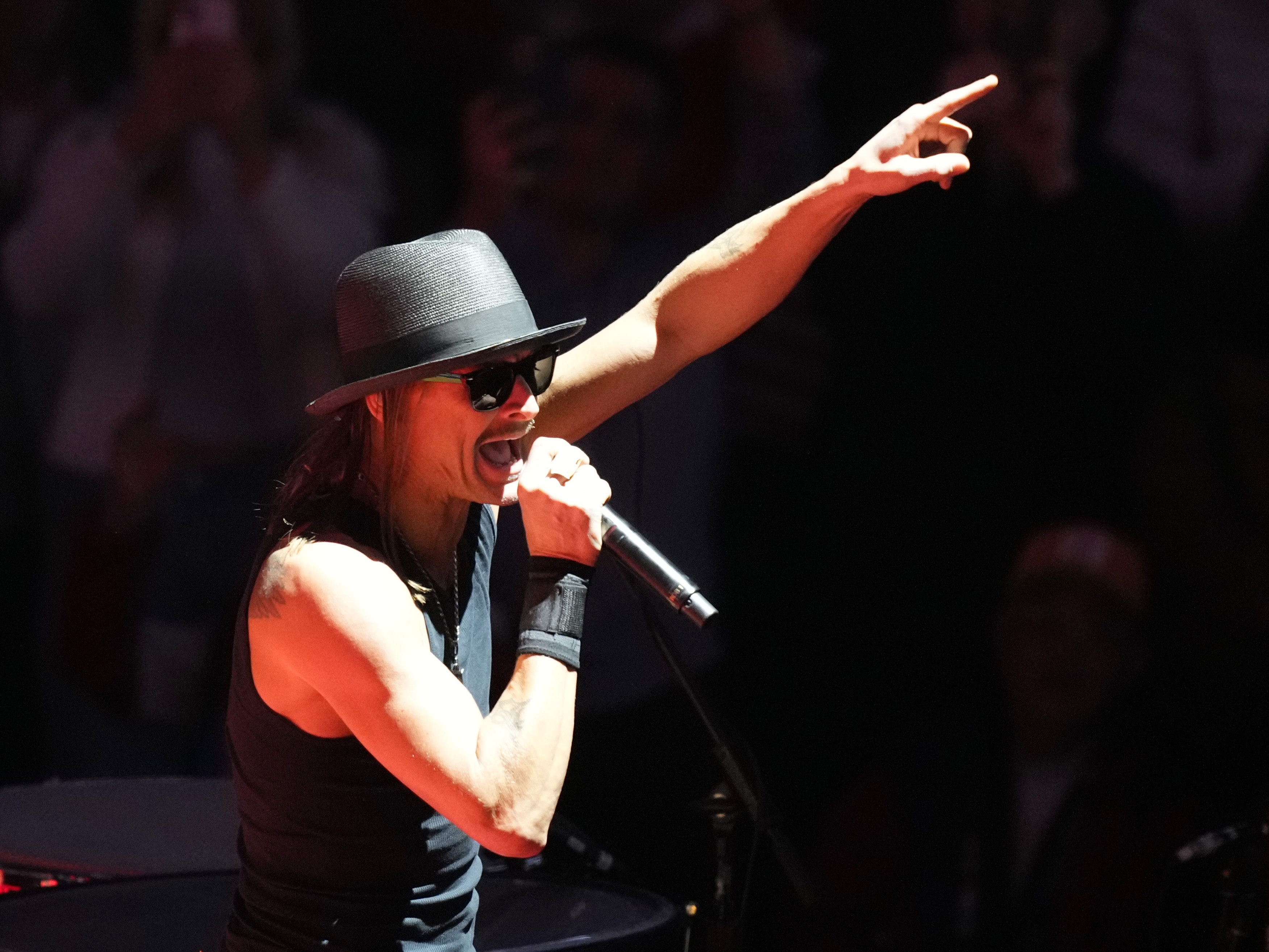 caption: Kid Rock performs before President-elect Donald Trump arrives at a rally ahead of the inauguration, on Jan. 19, 2025, in Washington.