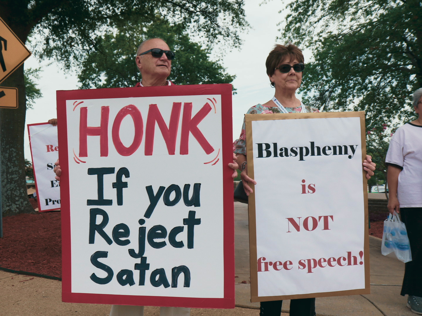 caption: <em>Hail Satan? </em>skimps on some devilish details, but as a profile of the Satanic Temple's efforts on behalf of the First Amendment, it's infernally compelling.