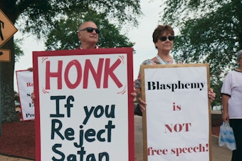 caption: <em>Hail Satan? </em>skimps on some devilish details, but as a profile of the Satanic Temple's efforts on behalf of the First Amendment, it's infernally compelling.