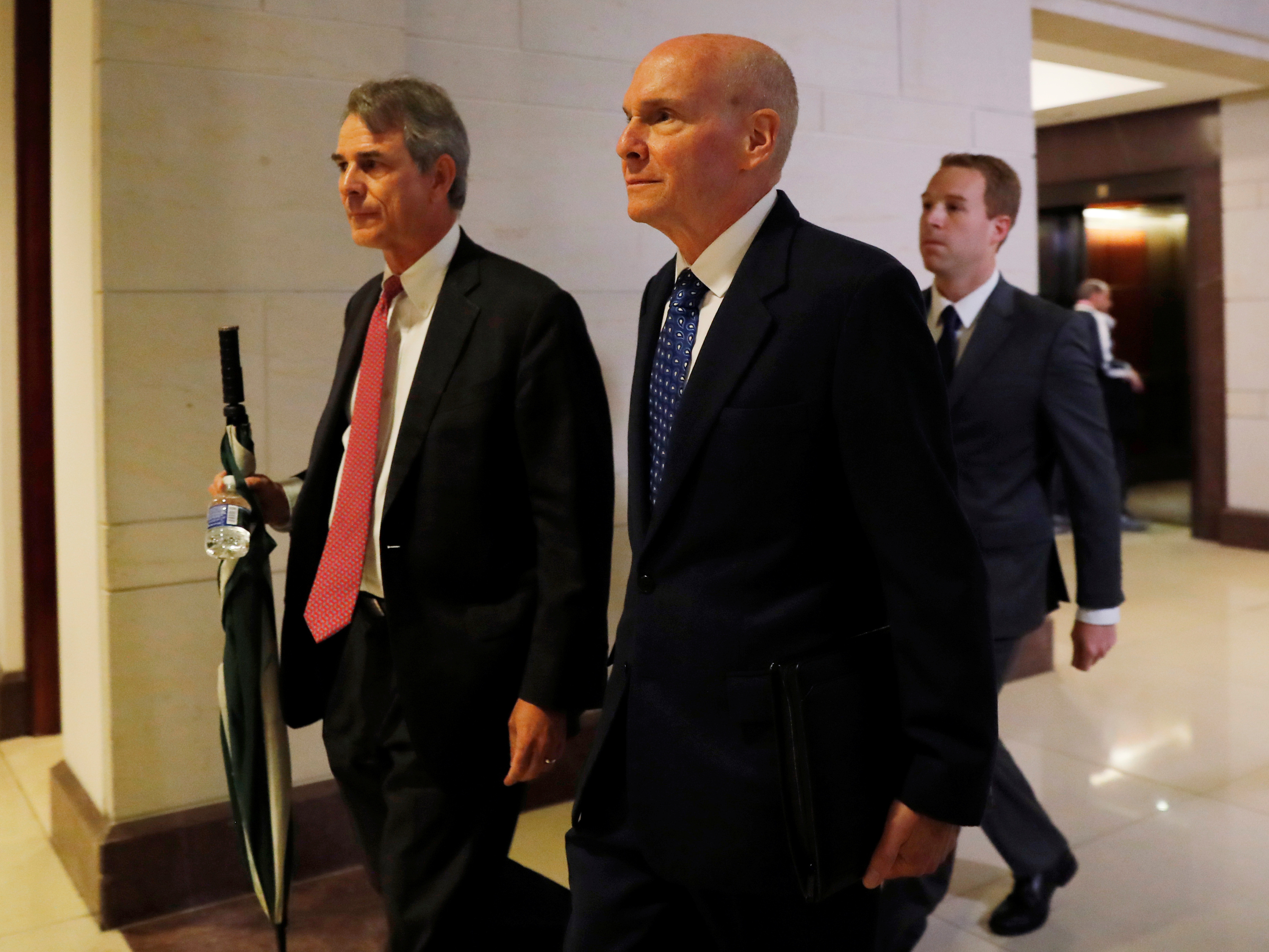 caption: Michael McKinley, former senior adviser to Secretary of State Mike Pompeo, arrives to testify at a closed-door deposition as part of the Democratic-led impeachment inquiry into U.S. President Donald Trump on Capitol Hill in Washington.