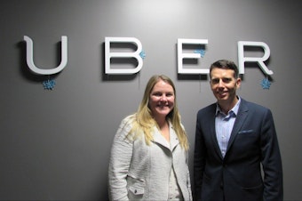caption: Uber General Manager Brooke Steger and chief adviser David Plouffe at the company's Seattle offices.