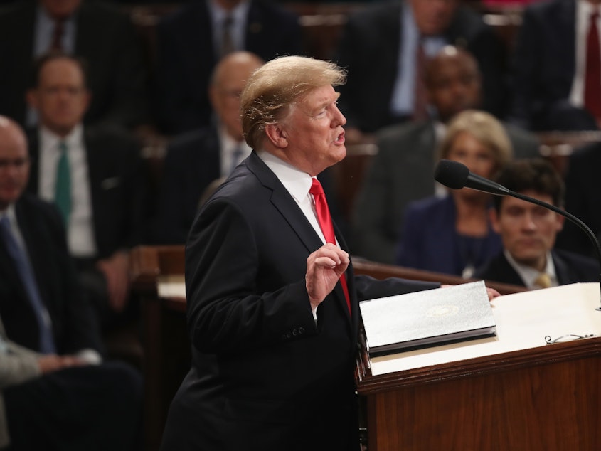caption: President Trump delivers the State of the Union address to Congress in 2019.