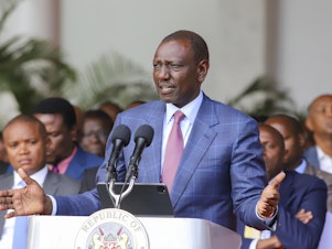 caption: Kenyan President William Ruto gives an address at the State House in Nairobi, Kenya, Wednesday. He said he won't sign into law a finance bill proposing new taxes a day after protesters stormed parliament and several people were shot dead.