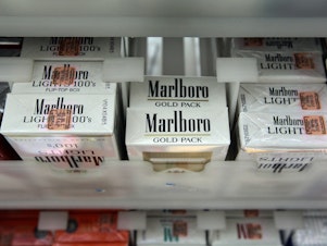 caption: In this 2010 file photo, a pack of Marlboro cigarettes is seen at the Quick Stop store in Miami, Fla. Philip Morris International's CEO Jacek Olczak said the company will stop selling Marlboro cigarettes in the U.K. in the next 10 years.