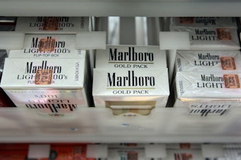 caption: In this 2010 file photo, a pack of Marlboro cigarettes is seen at the Quick Stop store in Miami, Fla. Philip Morris International's CEO Jacek Olczak said the company will stop selling Marlboro cigarettes in the U.K. in the next 10 years.