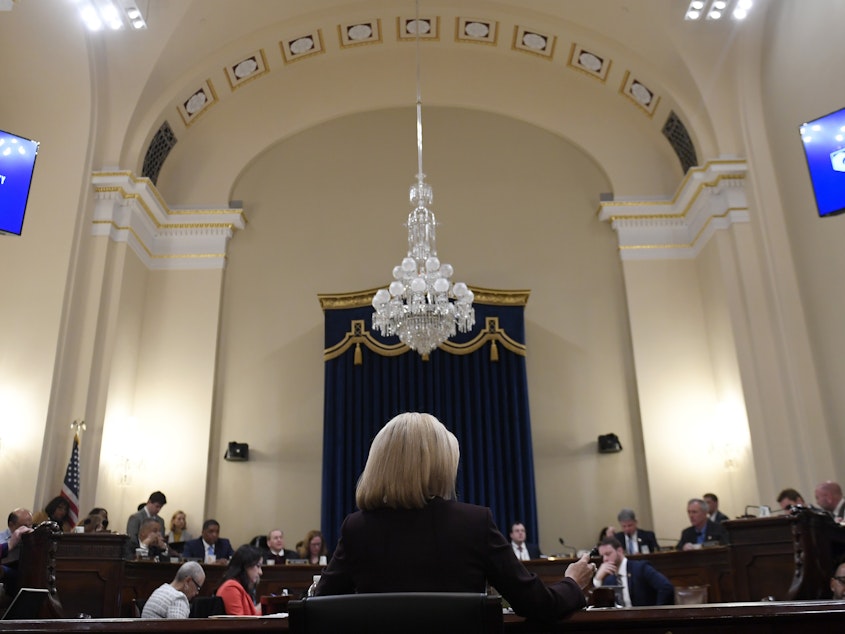 caption: Kirstjen Nielsen, then Homeland Security Secretary, testified on Capitol Hill before the House Homeland Security Committee in March. She said "cases of fake families are cropping up everywhere," among the surge of migrants at the Southern border.