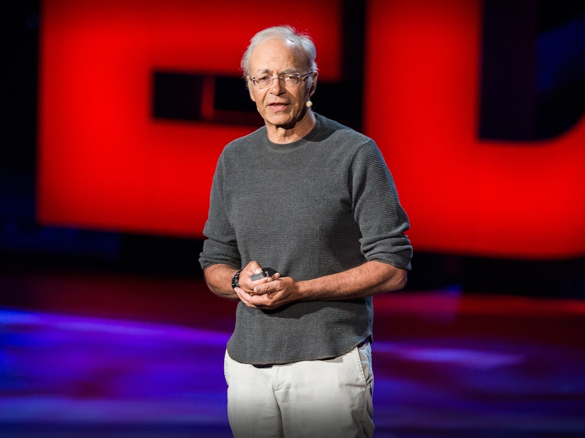 caption: Peter Singer speaks at TED2013.