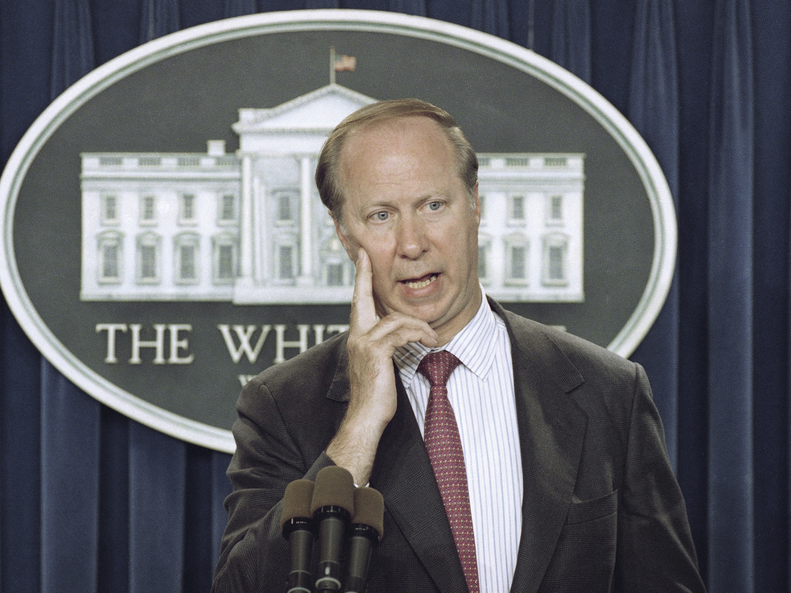 caption: David Gergen answers a reporter's question in the briefing room of the White House in Washington on June 7, 1993.