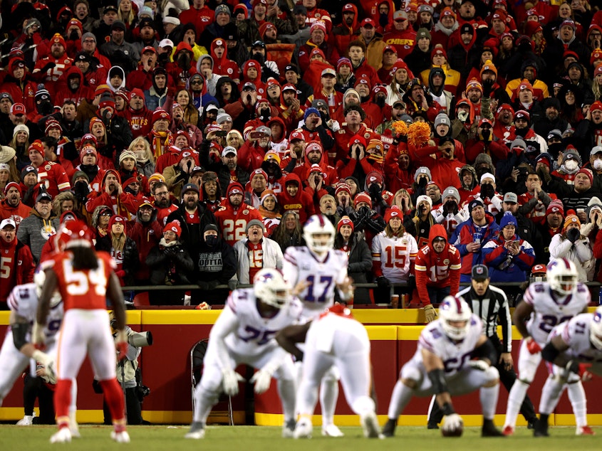 caption: Football fans reveled in the exciting matchup between the Kansas City Chiefs and the Buffalo Bills in the AFC Divisional Playoff game at Arrowhead Stadium — but the game's ending in overtime left some feeling unsatisfied.