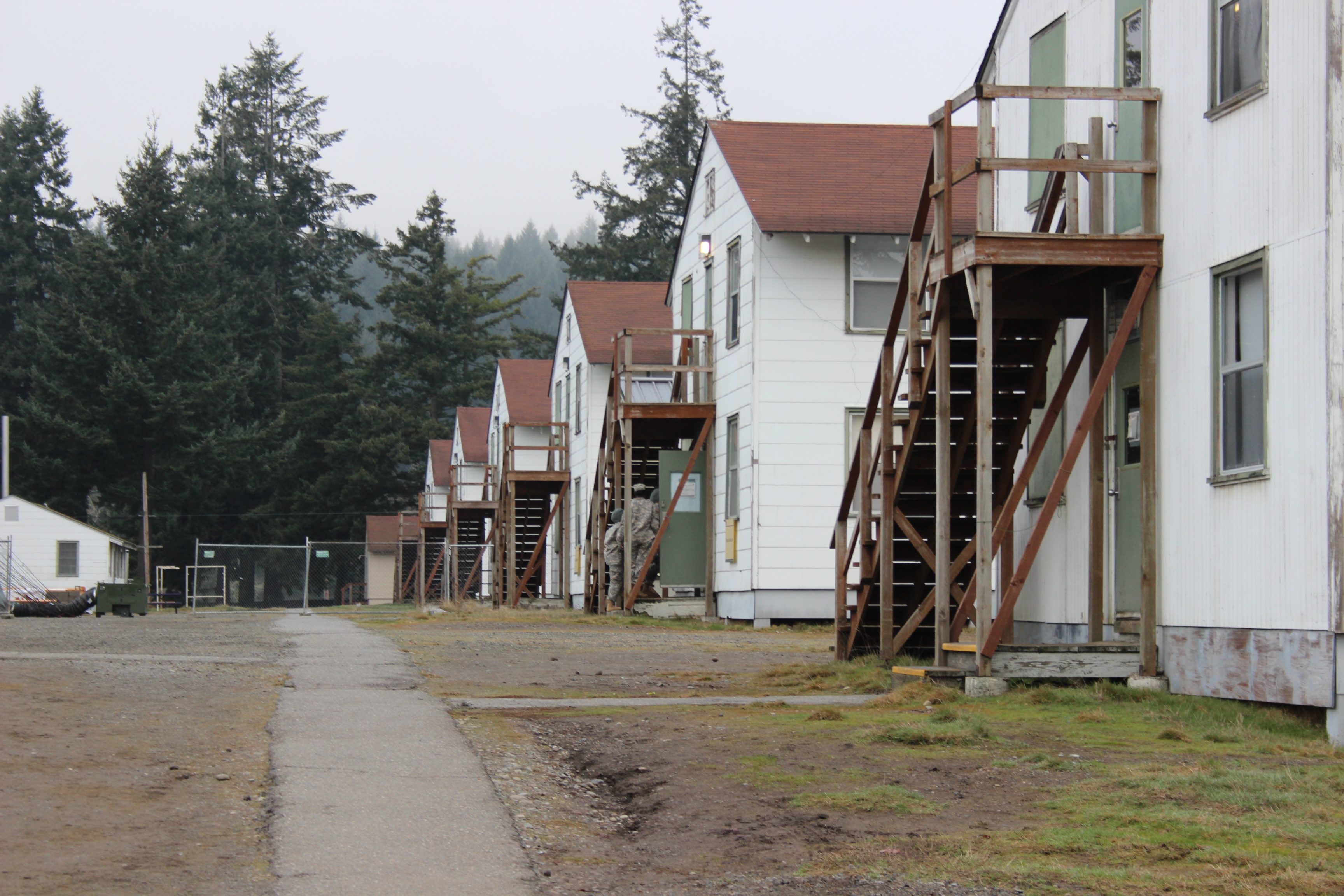 caption: The barracks in the controlled monitoring area at Joint Base Lewis-McChord. Up to a quarter of the soldiers and civilians there face losing their jobs.
