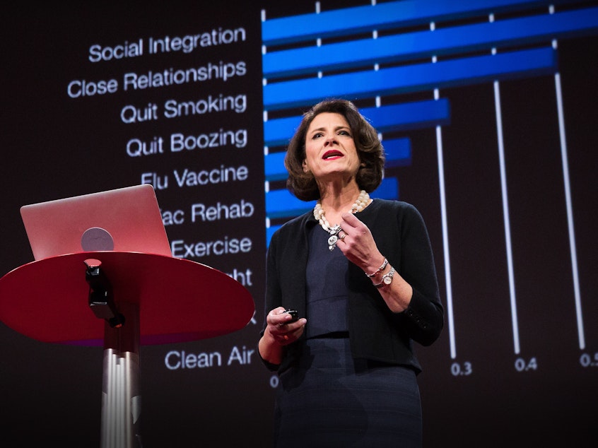 caption: Susan Pinker on the TED Stage.