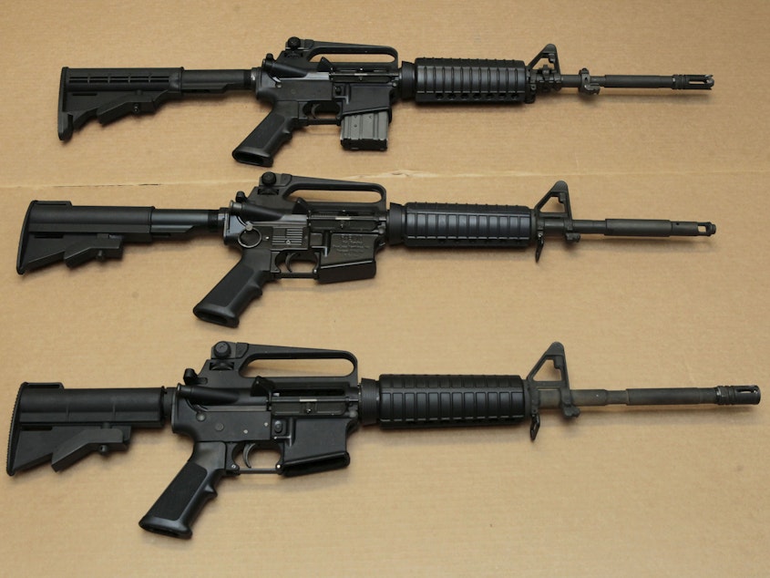 caption: Texas Gov. Greg Abbott says the gunman responsible for the Uvalde shooting Tuesday used an AR-15-style assault rifle. Here, three variations of the AR-15 are displayed at the California Department of Justice in Sacramento, Calif., in 2012.