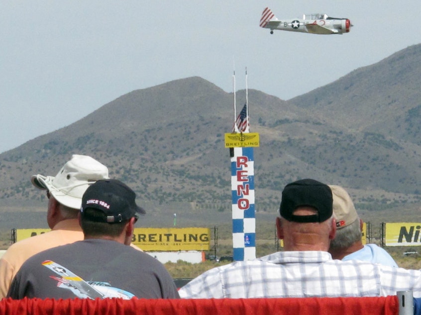 caption: This photo was taken on Sept. 14, 2012 at the National Championship Air Races in Reno, Nev. Two pilots died in a collision Sunday on what was the last day of the famed air races, which were being held for the last time ever this year in Reno.
