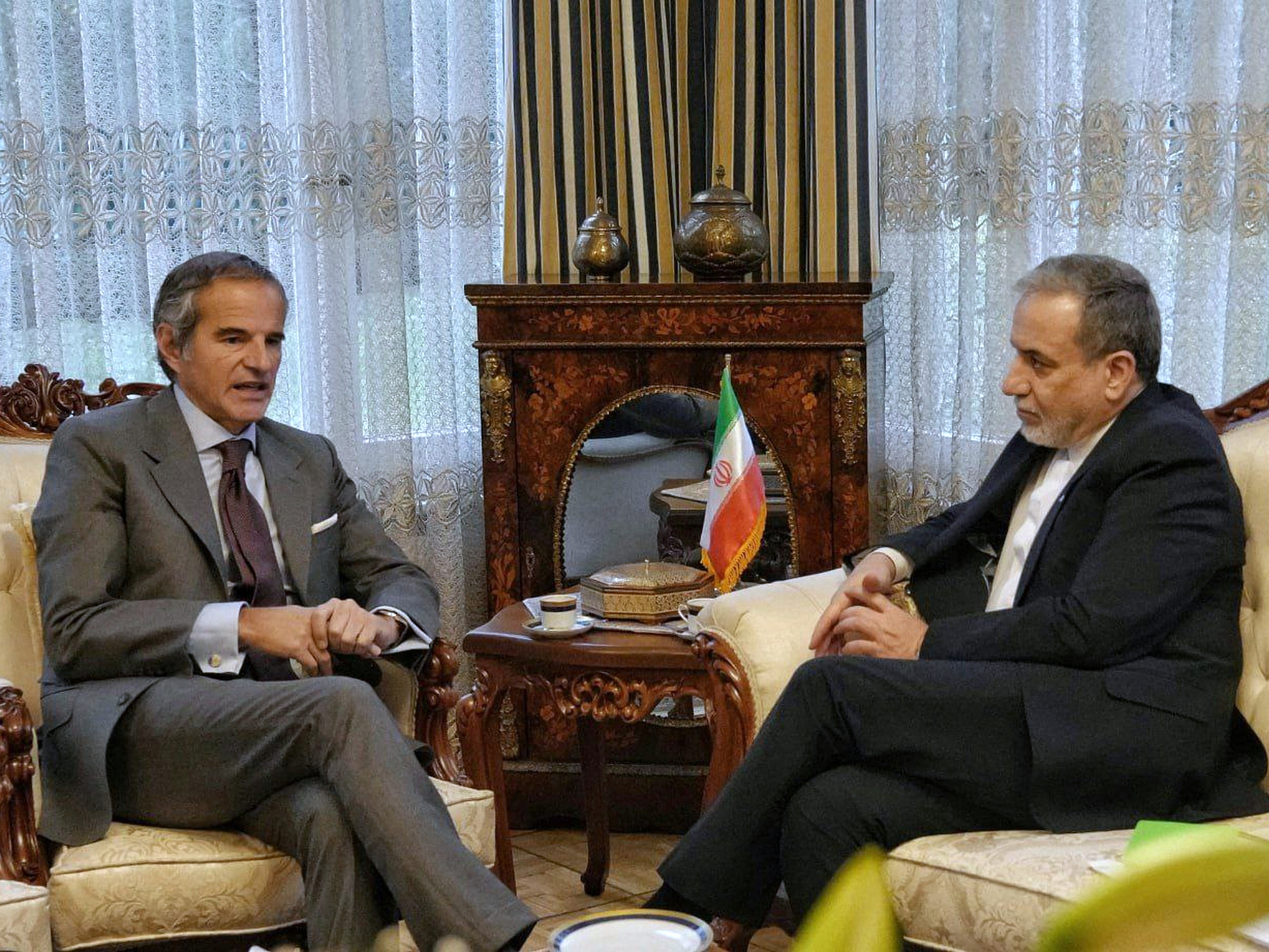 caption: In this photo released by the Iranian Foreign Ministry, Iranian Foreign Minister Abbas Araghchi, right, and International Atomic Energy Agency (IAEA) Director-General Rafael Grossi, left, hold a meeting in Geneva, Switzerland, Monday, Feb. 16, 2026.